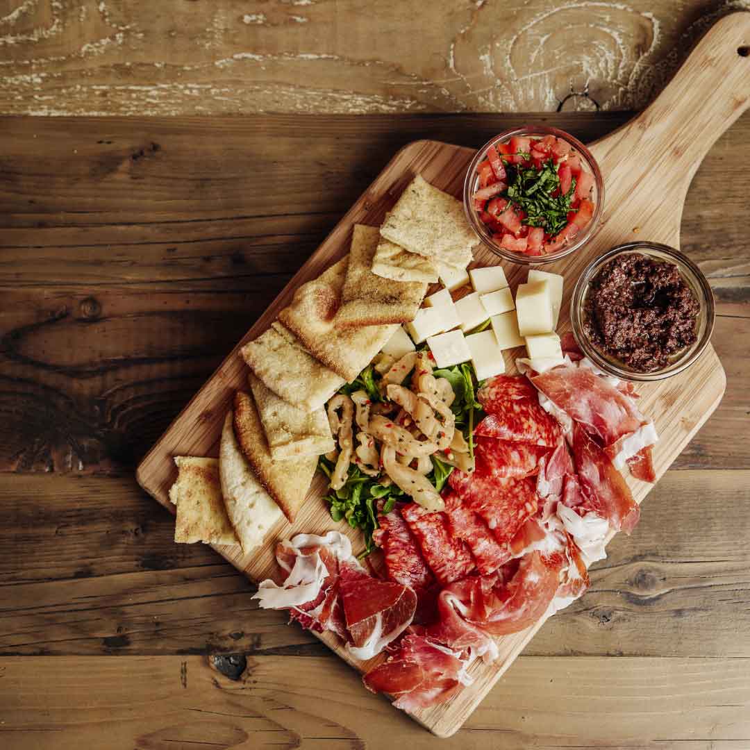 Charcuterie Board with food on it