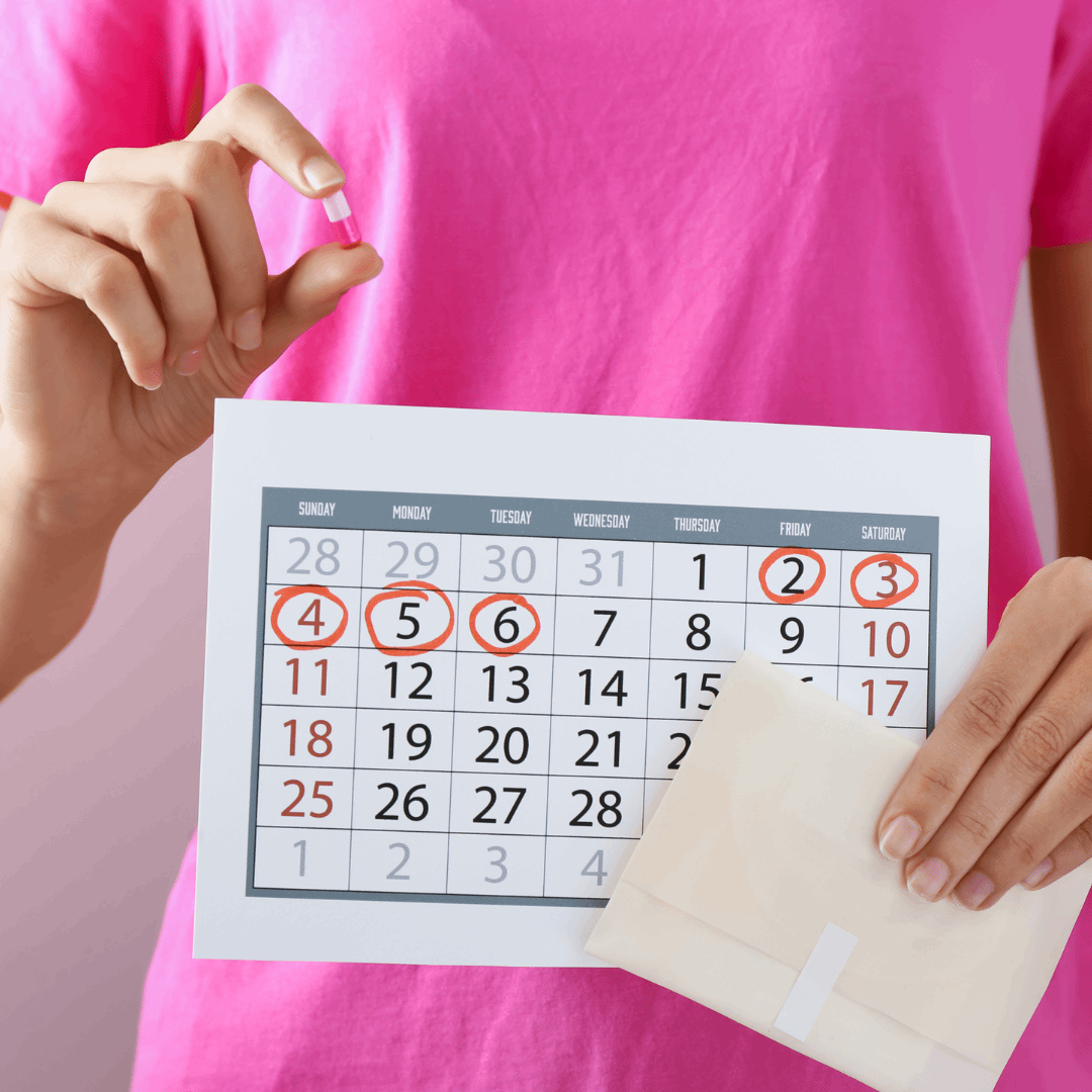 nurse holding calendar, medication, and sanitary napkin