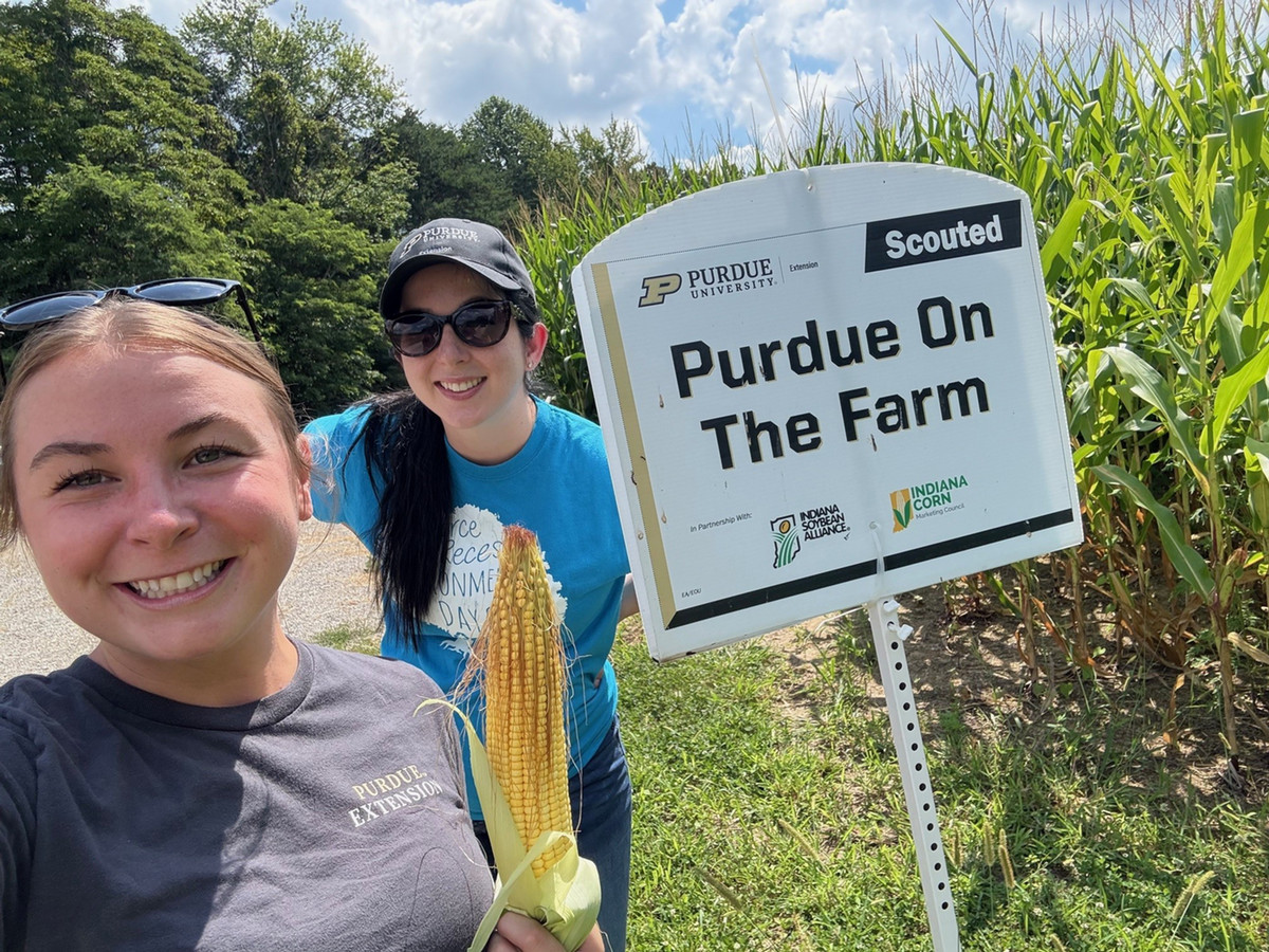 Purdue on the farm sign in field 