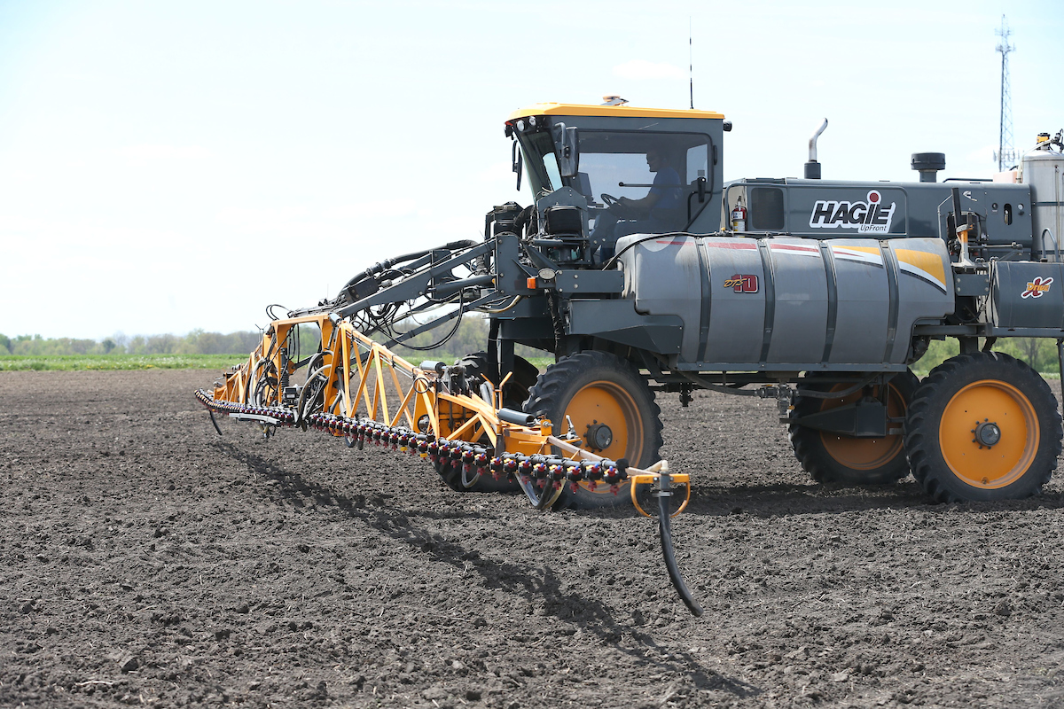 Pesticide spray rig in a field