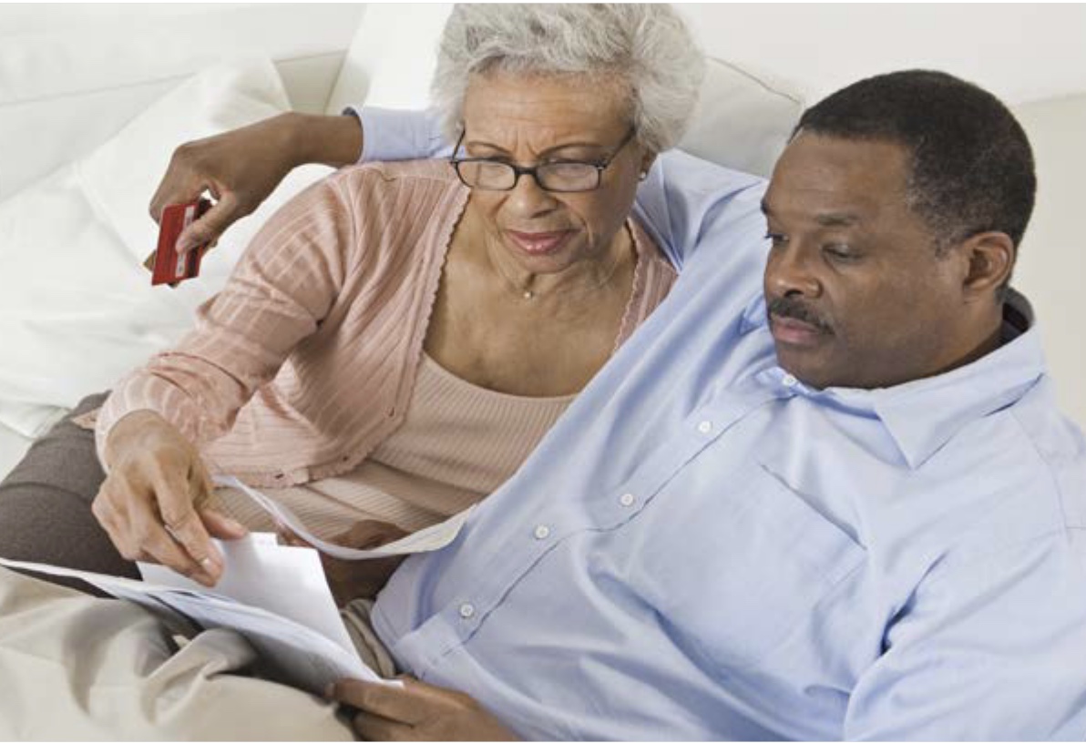 adult couple checking documents 
