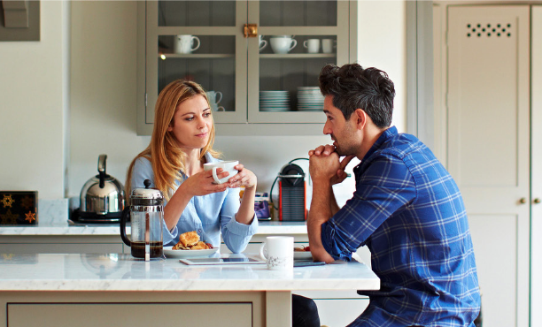 a couple talking on the kitchen