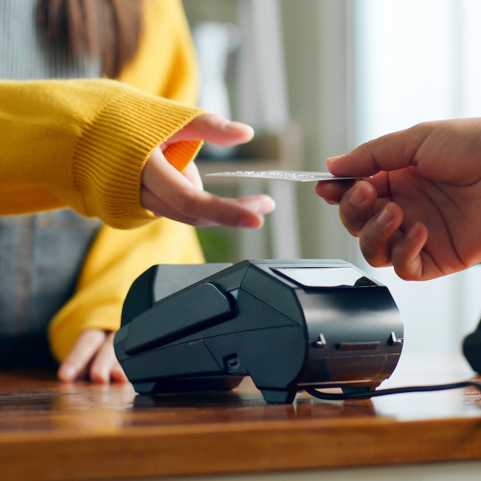 a person paying with a credit card