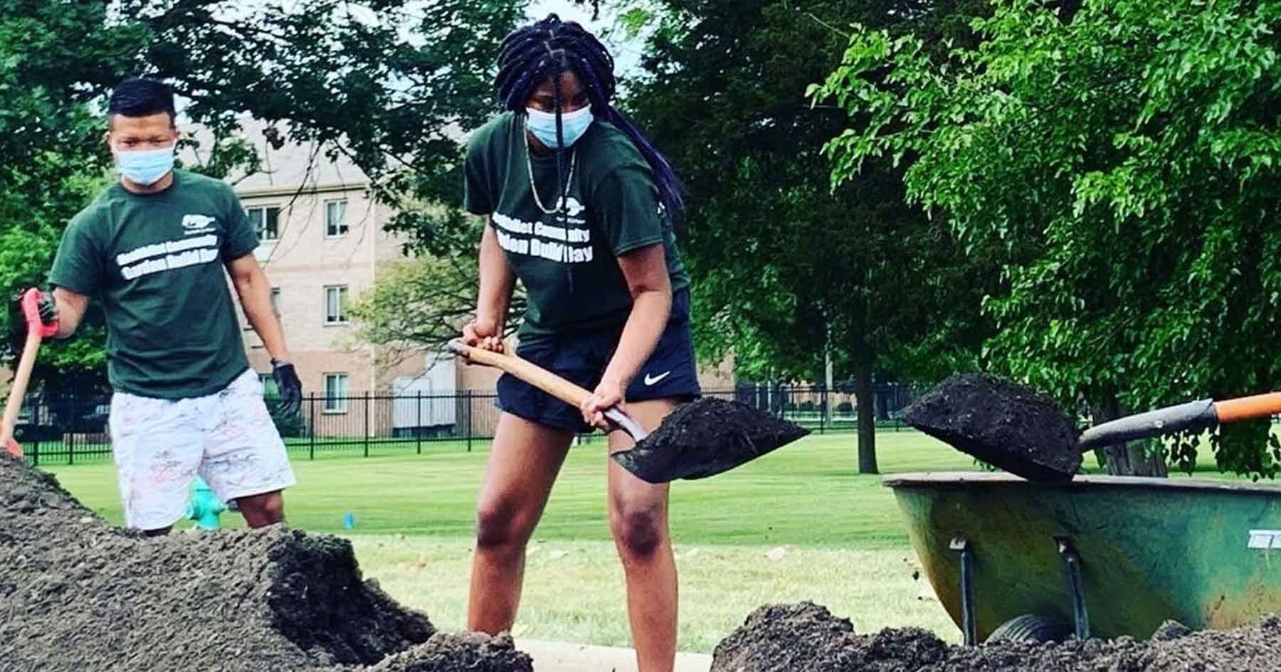 Volunteers working in a community garden