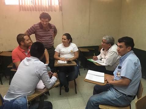 Dr. Henry Quesada, delivering educational programs to high school teachers in Guatemala