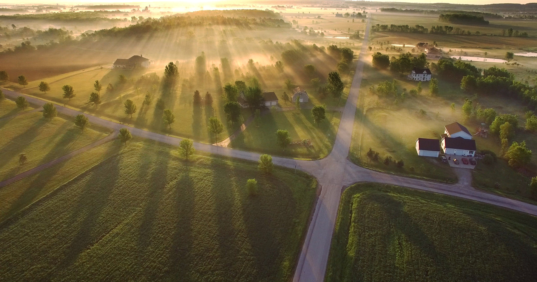 aerial view of houses sitting in the country 