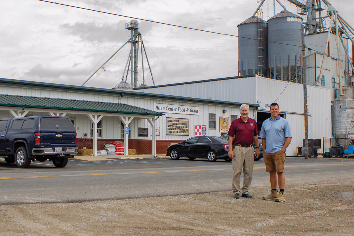 Lynn Stieglitz and his son Jeremy standing in front of Milan  Center Feed and Grain in Northeast Indiana
