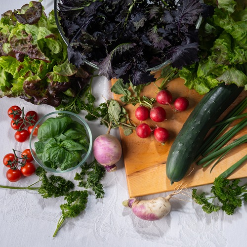 vegetables laid out on a table ready to be prepared
