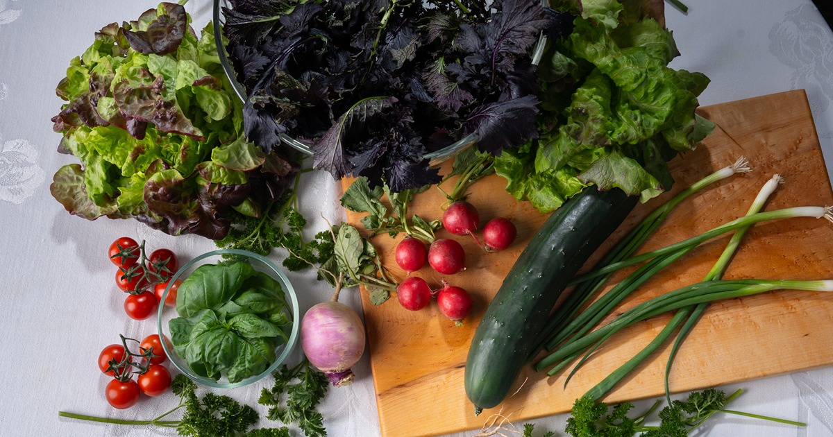 vegetables laid out on a table ready to be prepared