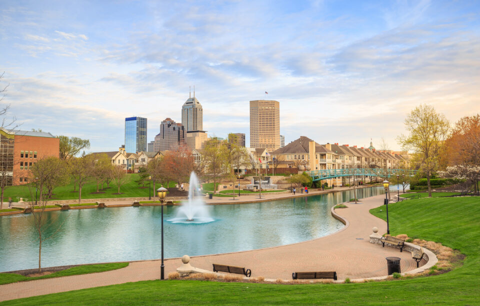 modern city with lake and fountain 