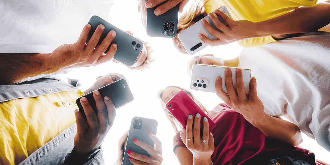 People looking at their cellphone