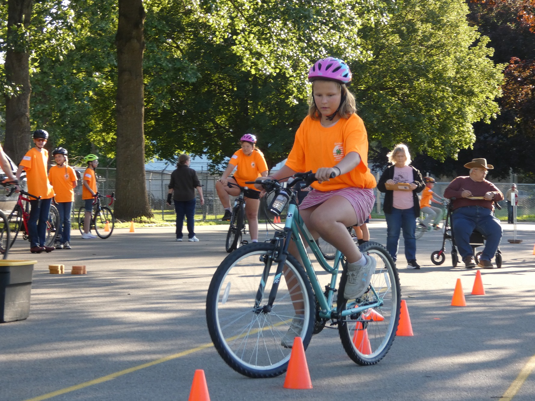 Rose Leeper dodging around cones to complete one of her favorite obstacle rides
