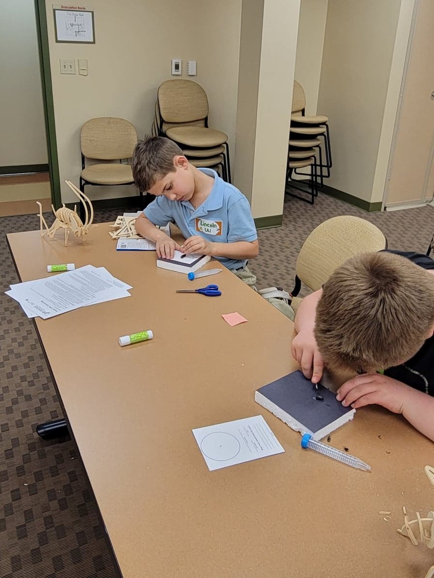 children working on art