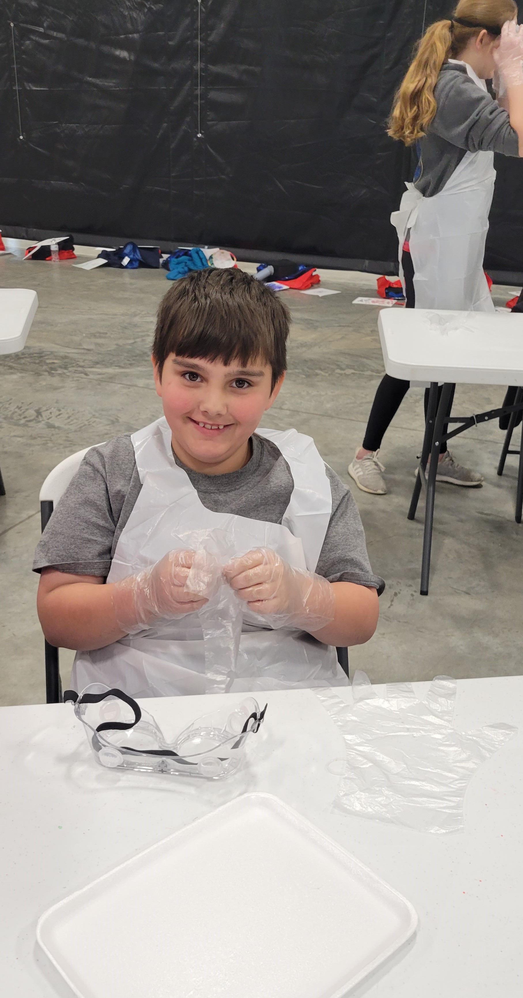 child with protective eye gear