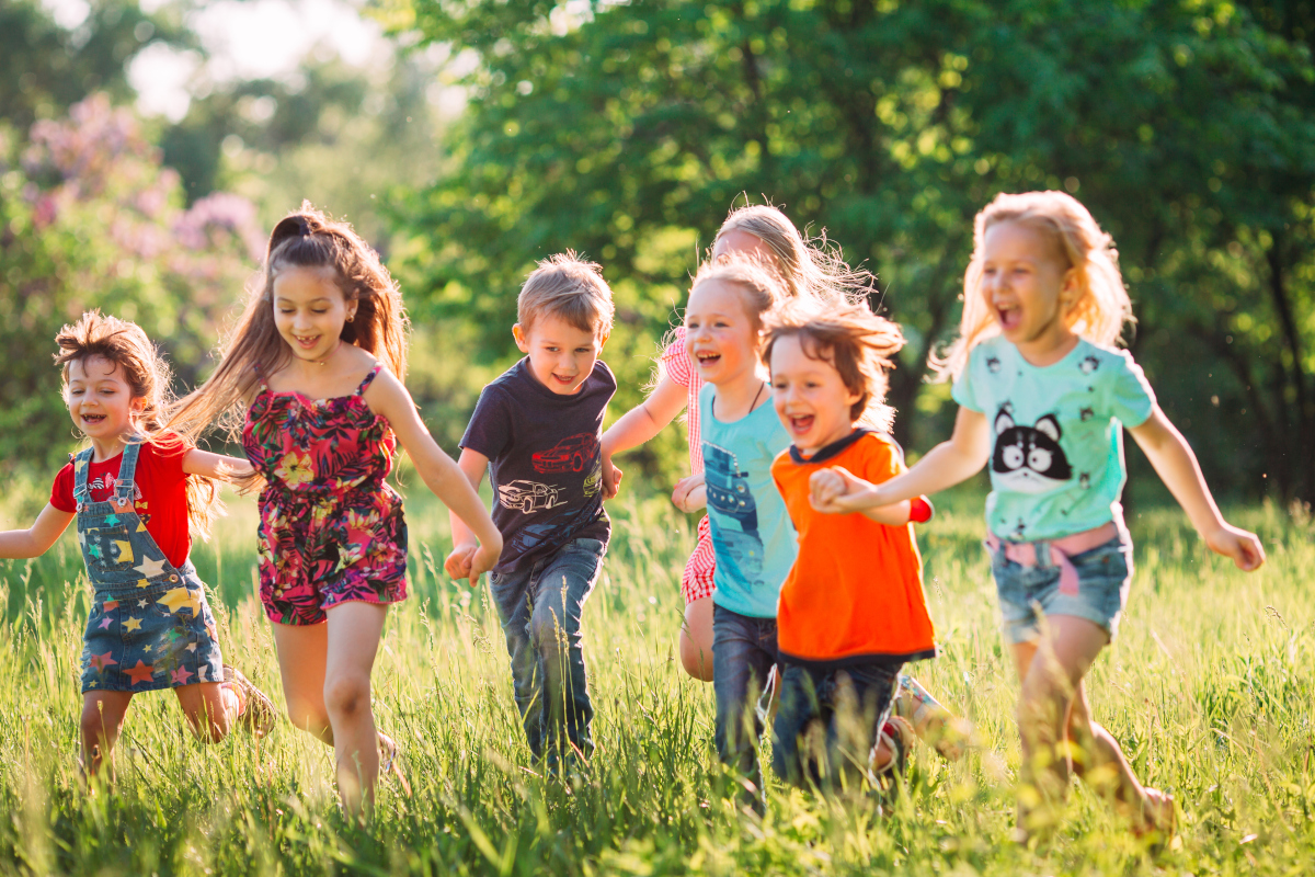 children running in a field