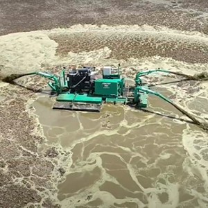 liquid tractor pulled applicator in lagoon