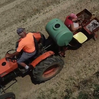 Image of a tractor  working in a field